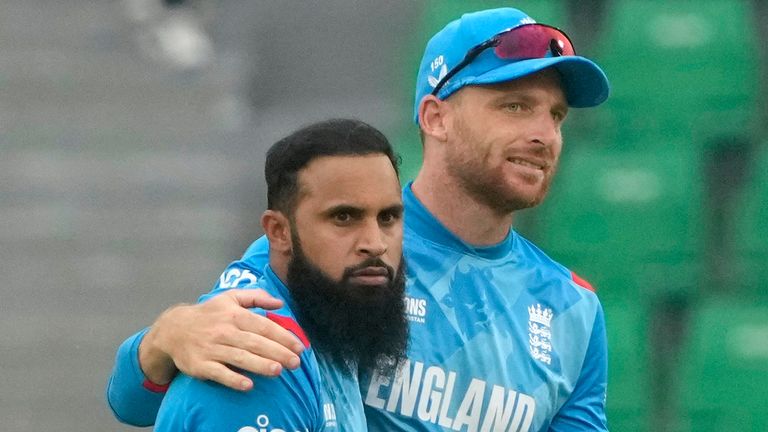 England's Adil Rashid and Jos Buttler, ICC Champions Trophy (Associated Press)