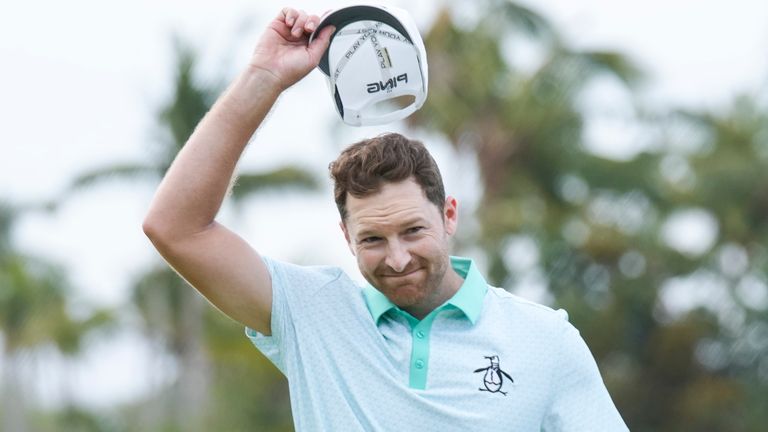 Brian Campbell, of the United States, celebrates after winning the Mexico Open golf tournament in Puerto Vallarta, Mexico, Sunday, Feb. 23, 2025. (AP Photo/Fernando Llano)