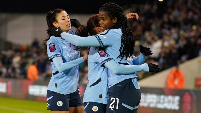 Bunny Shaw celebrates after scoring against Liverpool on her return to Man City's starting XI