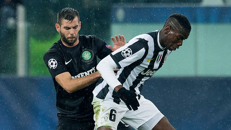 06/03/13 UEFA CHAMPIONS LEAGUE LAST 16 2ND LEG.JUVENTUS v CELTIC.JUVENTUS STADIUM - TURIN.Paul Pogba (right) holds off Celtic's Joe Ledley