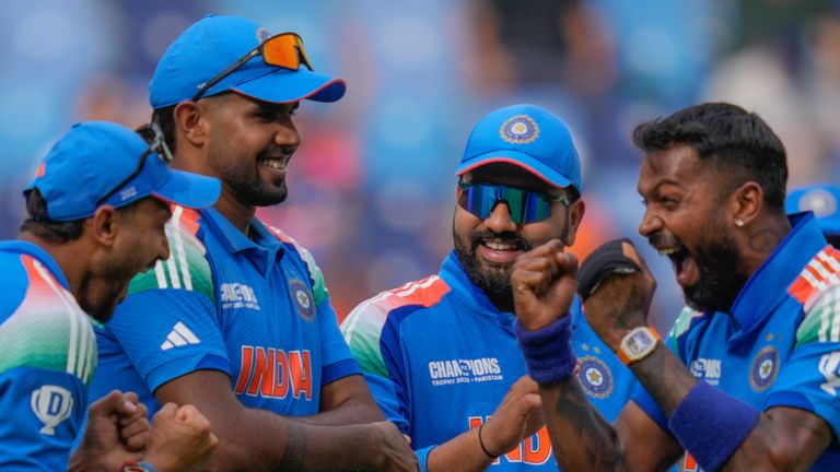 The Indian Hardic Pandia celebrates the right with his teammate The Wicket of Pakistan SAUD Shakeel during the Cricket match in the ICC Championship between India and Pakistan at Dubai International Cricket Stadium, United Arab Emirates, Sunday, February 23, 2025. (AP Photo/Altaf Qadri)