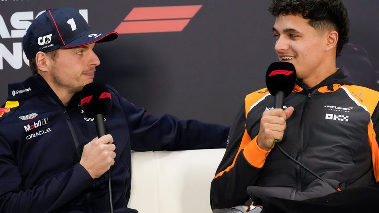 Red Bull driver Max Verstappen of the Netherlands, left, and McLaren driver Lando Norris of Britain talk at a press conference during a Formula One pre-season test at the Bahrain International Circuit in Sakhir, Bahrain, Thursday, Feb. 27, 2025. (AP Photo/Darko Bandic)