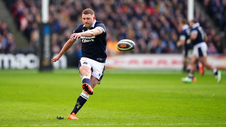 Scotland's Finn Russell kicks a conversion vs Italy