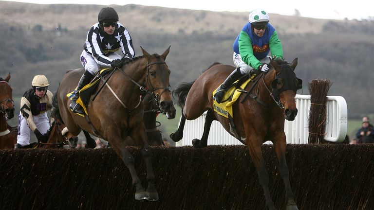 Imperial Commander and Paddy Brennan (left) on their way to winning the Ryanair Chase at the Cheltenham Festival