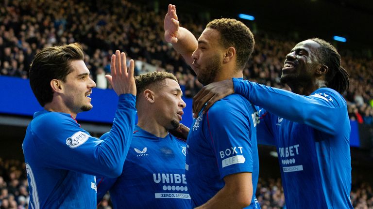 GLASGOW, SCOTLAND - FEBRUARY 02: Rangers' Ianis Hagi (L) celebrates scoring to make it 1-0 with teammates Cyriel Dessers (C) and Clinton Nsiala during a William Hill Premiership match between Rangers and Ross County at Ibrox Stadium, on February 02, 2025, in Glasgow, Scotland.  (Photo by Alan Harvey / SNS Group)