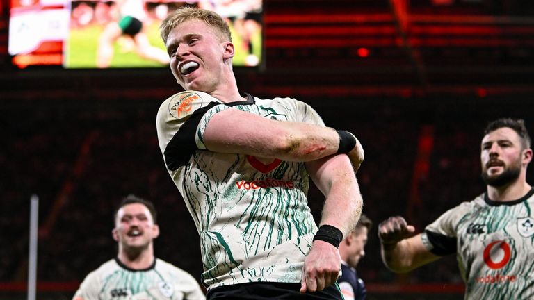 Wales , United Kingdom - 22 February 2025; Jamie Osborne of Ireland celebrates after scoring his side's second try during the Guinness Six Nations Rugby Championship match between Wales and Ireland at the Principality Stadium in Cardiff, Wales. (Photo By Seb Daly/Sportsfile via Getty Images)