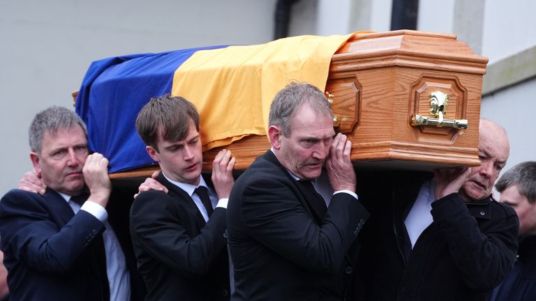 The coffin of Michael O'Sullivan is carried into St John the Baptist Church, Glantane