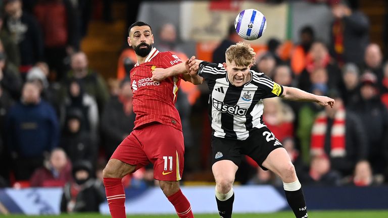 Mohamed Salah was denied a penalty for Liverpool following a challenge from Newcastle defender Lewis Hall