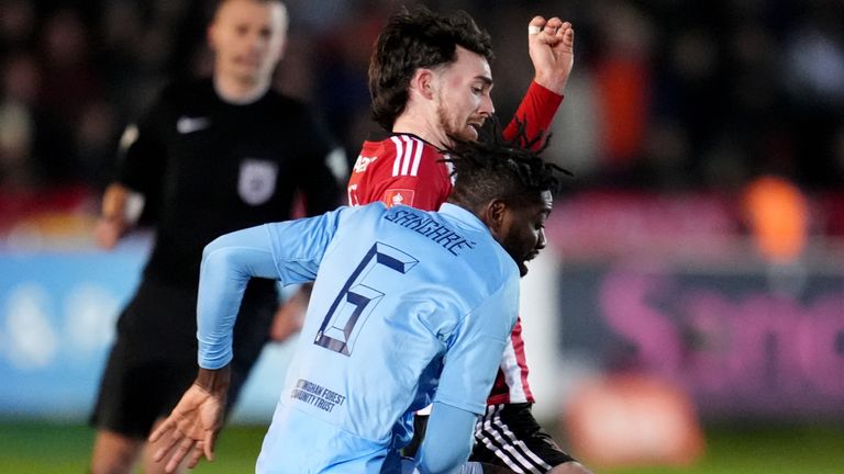 Nottingham Forest's Ibrahim Sangare and Exeter City's Ed Francis battle for the ball