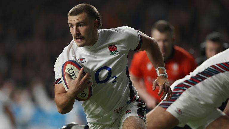 England's Ollie Sleightholme runs onto score a try during the Autumn Nations series rugby union match between England and South Africa, at Twickenham, in London, Saturday, Nov. 16, 2024. (AP Photo/Ian Walton)