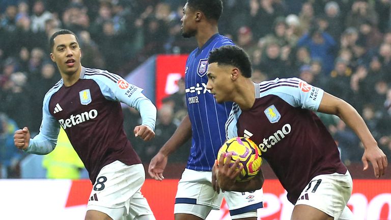 Aston Villa's Ollie Watkins (centre) celebrates scoring their equaliser against 10-player Ipswich