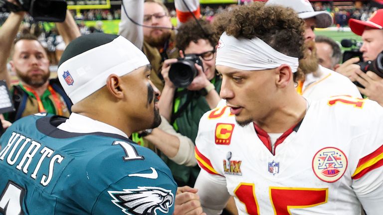 Jalen Hurts and Patrick Mahomes embrace after the game 