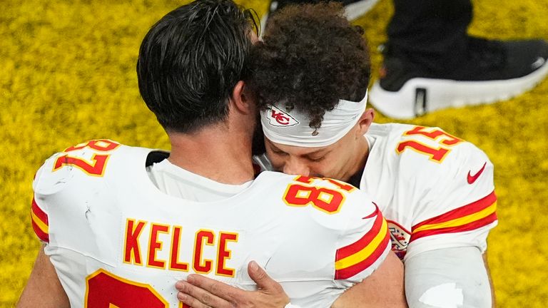 Kansas City Chiefs tight end Travis Kelce (87) embraces quarterback Patrick Mahomes (15) on the sideline during the NFL Super Bowl 59 football game against the Philadelphia Eagles, Sunday, Feb. 9, 2025, in New Orleans. (Kyle Rivas/Kansas City Chiefs via AP)