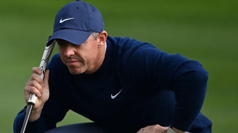 Rory McIlroy, of Northern Ireland, lines his putt on the 15th green at Pebble Beach Golf Links during the final round of the AT&T Pebble Beach Pro-Am golf tournament, Sunday, Feb. 2, 2025, in Pebble Beach, Calif. (AP Photo/Nic Coury)