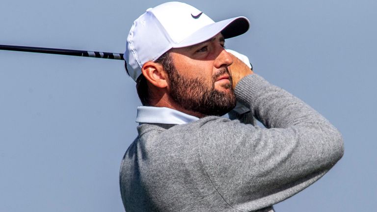 LA JOLLA, CA, CA - FEBRUARY 14: Scottie Scheffler watches his drive from the 13th tee during the second round of the Genesis Invitational tournament, Friday, February 14, 2025, at Torrey Pines Golf Course in La Jolla, California. (Photo by Tony Ding/Icon Sportswire) (Icon Sportswire via AP Images)