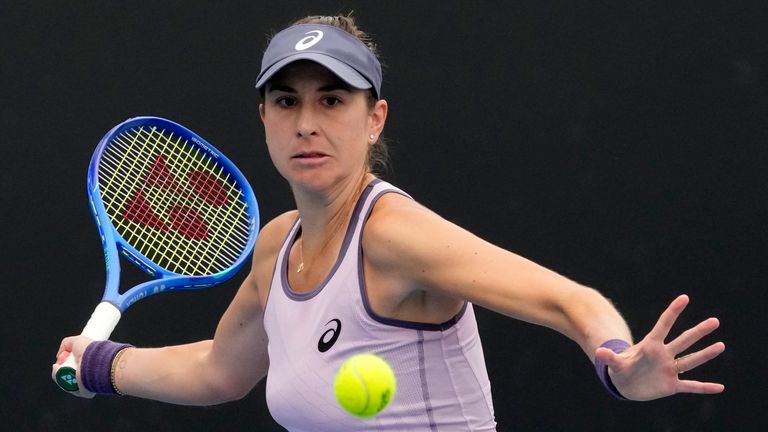 Belinda Bencic of Switzerland plays a forehand return to Suzan Lamens of the Netherlands during their second round match at the Australian Open tennis championship in Melbourne, Australia, Wednesday, Jan. 15, 2025. (AP Photo/Manish Swarup)