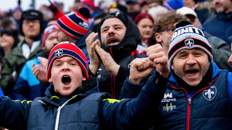 Picture by Allan McKenzie/SWpix.com - 15/02/2025 - Rugby League - Betfred Super League Round 1 - Leeds Rhinos v Wakefield Trinity - AMT Headingley, Leeds, England - Wakefield fans celebrate their side scoring against Leeds.