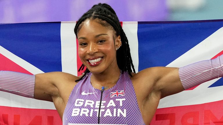 Amber Anning, of Great Britain, poses after winning the gold medal in the women's 400m final at the World Athletics Indoor Championships in Nanjing, China, Saturday, March 22, 2025. (AP Photo/Vincent Thian)