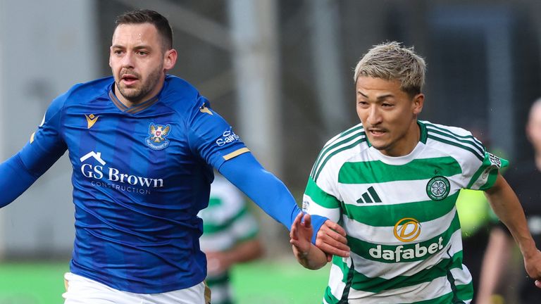 PERTH, SCOTLAND - SEPTEMBER 28: St Johnstone's Drey Wright (L) and Celtic's Daizen Maeda in action during a William Hill Scottish Premiership match between St Johnstone and Celtic at McDiarmid Park, on September 28, 2024, in Perth, Scotland. (Photo by Ross MacDonald / SNS Group)