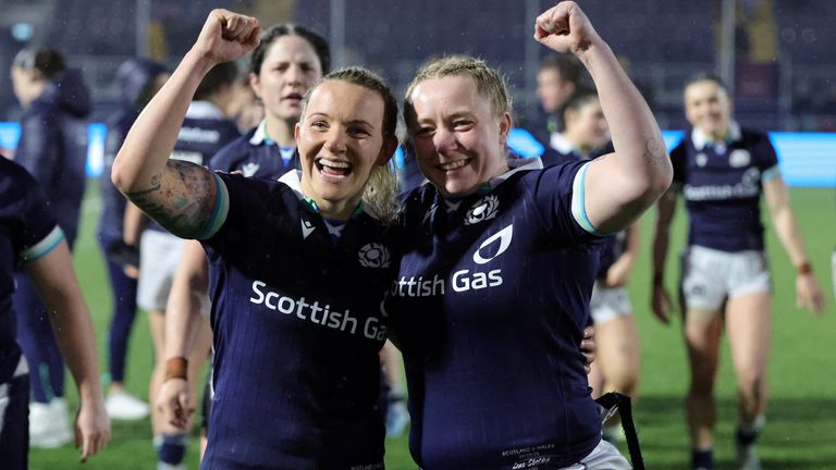 Scotland's Chloe Rollie (left) and Lana Skeldon celebrate the win after the Guinness Women's Six Nations match at the Hive Stadium, Edinburgh. Picture date: Saturday March 22, 2025.