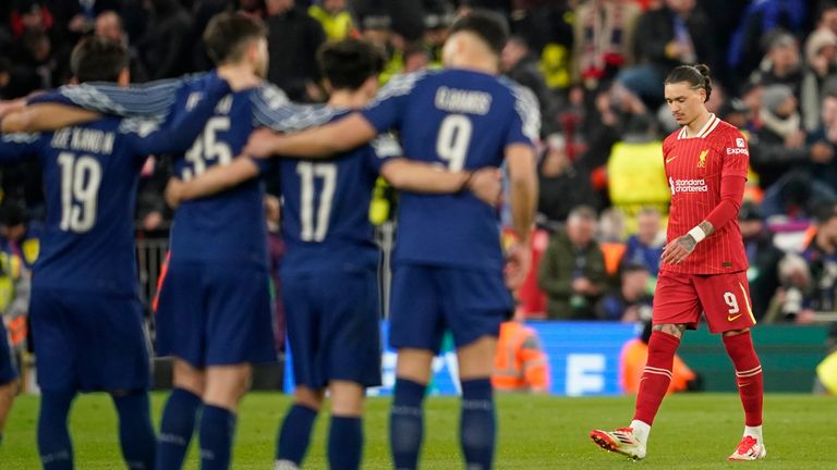 Liverpool's Darwin Nunez walks back after PSG's goalkeeper Gianluigi Donnarumma saved his penalty during a shootout at the end of the Champions League round of 16 second leg soccer match between Liverpool and Paris Saint-Germain at Anfield in Liverpool, England, Tuesday, March 11, 2025. (AP Photo/Dave Thompson)