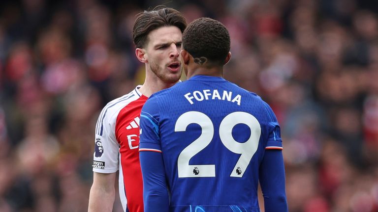 Declan Rice and Wesley Fofana exchange words during the Premier League match between Arsenal and Chelsea at the Emirates stadium (AP Photo/Ian Walton)