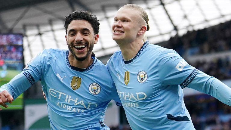 Manchester City's Erling Haaland celebrates his goal with Omar Marmoush