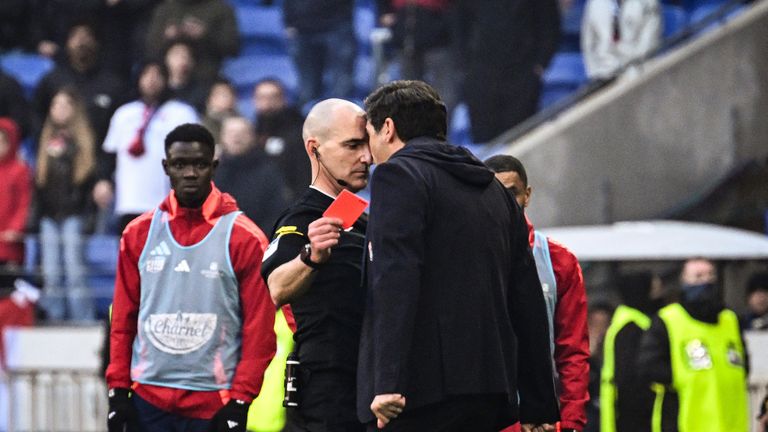 Lyon's Portuguese head coach Paulo Fonseca clashes with referee Neoit Millot 