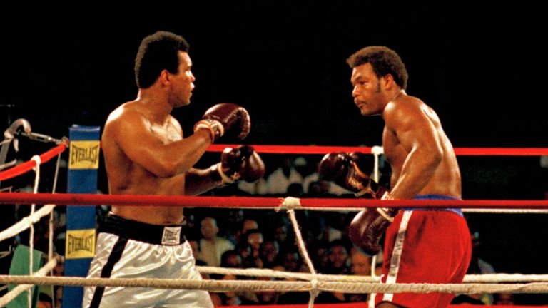 Muhammad Ali, left, during fight with George Foreman, red shorts, in Kinshasa, Zaire, October 30, 1974