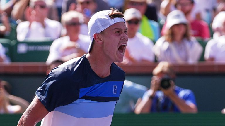 Holger Rune celebrates after defeating Daniil Medvedev in the Indian Wells semi-finals