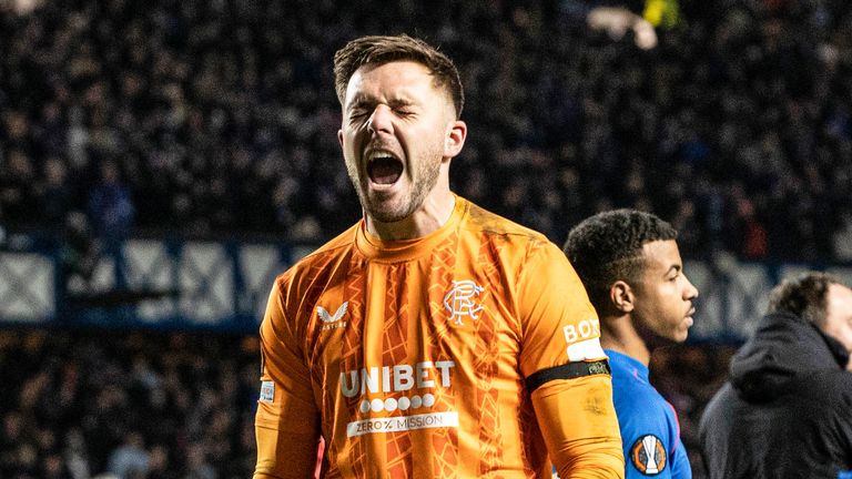 Rangers' Jack Butland celebrates after his penalty saves 