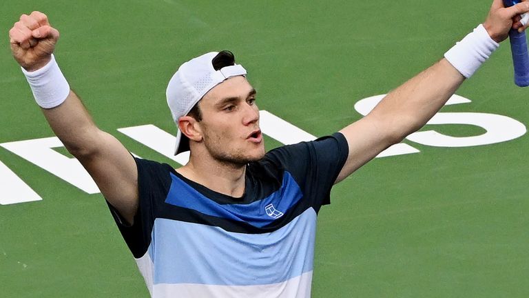 Jack Draper celebrates after his straight-sets win over Taylor Fritz