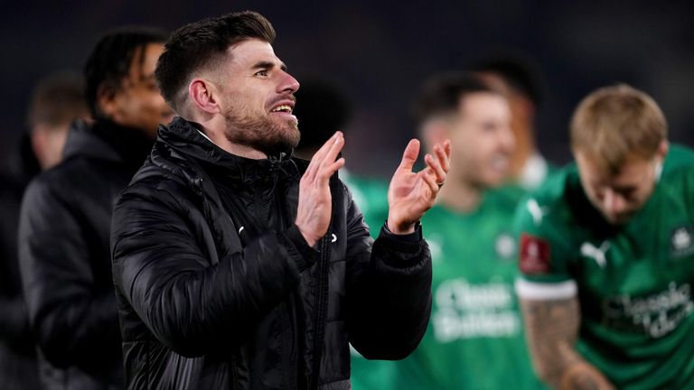 Captain Pleimmouth Arjel Joe Edwards praises the charge of the Acting Fans after the third match of the FA Cup at the Gtech Community Stadium, London.