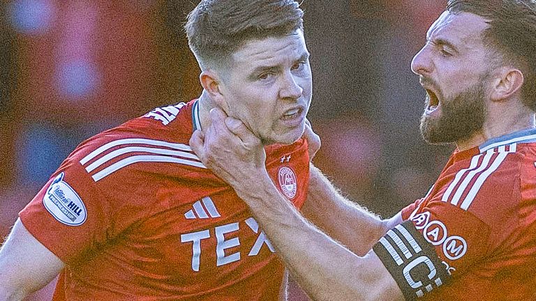 Aberdeen, Scotland - 02 March: Kevin Nesbit celebrates Aberdeen with Gray Cenyr after his scoring to make him 2-2 during the Excellent William Hill match between Aberdeen and Dundy United at Beetodri Stadium, on March 02, 2025, in Aberdeen, Scotland. (Ross Parker / SNS group)