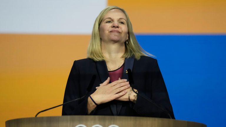 Kirsty Coventry reacts after she was announced as the new IOC President at the International Olympic Committee 144th session in Costa Navarino in western Greece on Thursday, March 20, 2025 (AP Photo/Thanassis Stavrakis)