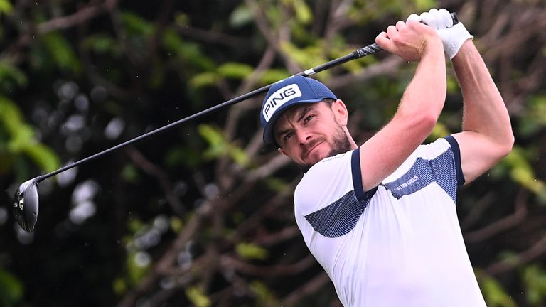 Laurie Canter of England tees off during a play off on the 18th hole on day four of the Investec South African Open Championship