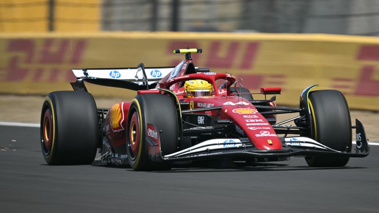 Ferrari's British driver Lewis Hamilton drives during the sprint race of the Formula One Chinese Grand Prix at the Shanghai International Circuit in Shanghai on March 22, 2025. (Photo by HECTOR RETAMAL / AFP)