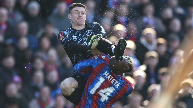 Millwall goalkeeper Liam Roberts, heading Jean-Philippe Mateta at the beginning of a high boot, leaving the crystal palace in need of treatment for a long time