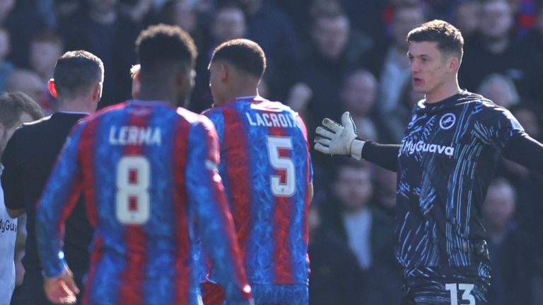 Millwall Liam Roberts goalkeeper reacts before taking a red card for a high challenge in Jean-Philippe Matthery of Crystal Palace (AP Photo/Ian Walton)