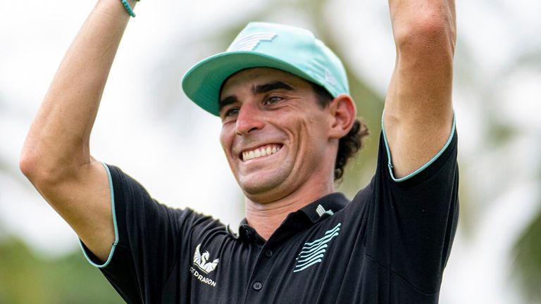 First place individual champion, Captain Joaqu..n Niemann of Torque GC celebrates with the Individual Champion Event Trophy after the final round of LIV Golf Singapore at Sentosa Golf Club on Sunday, March 16, 2025 in Sentosa, Singapore. (Photo by Matthew Harris/LIV Golf via AP)