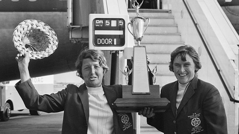 Lynne Thomas (R) alongside Rachael Heyhoe Flint on their return from the West Indies in 1971 holding the Pearl And Dean Cricket Trophy