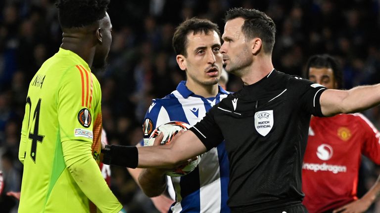 Andre Onana and Mikel Oiarzabal with the referee during Man Utd's Europa League clash at Real Sociedad