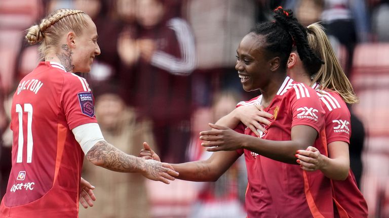 Manchester United's Melvine Malard celebrates her goal