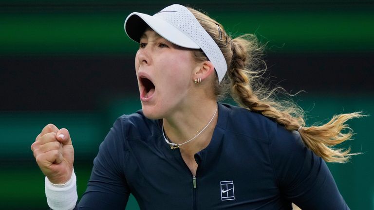 Mirra Andreeva, of Russia, celebrates winning a point against Iga Swiatek