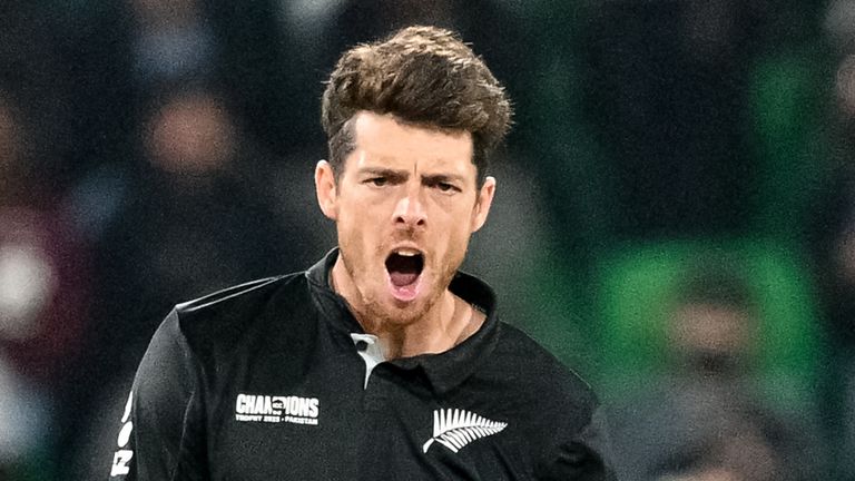 New Zealand's Captain Mitchell Santner Celebrates After taking the wicket of His South African Counterpart Temba Bavuma During the ICC Champions Trophy One-Day International (ODI) Semi-Final Cricket Match Between New Zealand and South Africa at The Gaddafi Stadium In Lahore on 5, 2025. (Photo by Asif Hassan / AFP)