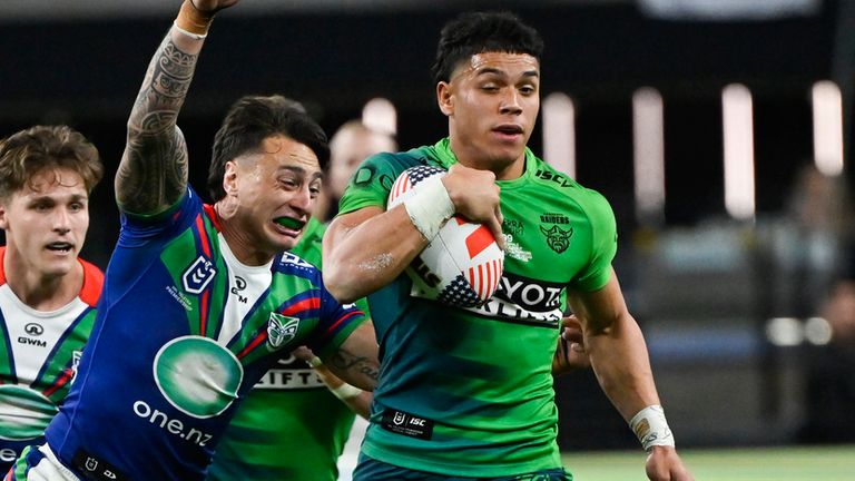 Canberra Raiders star Savelio Tamale breaks away from New Zealand Warriors' Charnze Nicoll-Klokstad at Allegiant Stadium (AP Photo/David Becker)