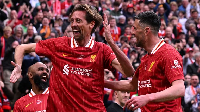 Peter Crouch rolled back the years with a double for Liverpool Legends - before breaking out his robot celebration!