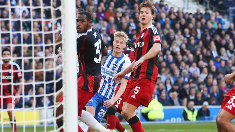 Jan Paul van Hecke heads Brighton level against Fulham