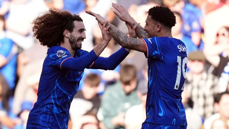 Marc Cucurella celebrates with Jadon Sancho after giving Chelsea a second-half lead against Leicester