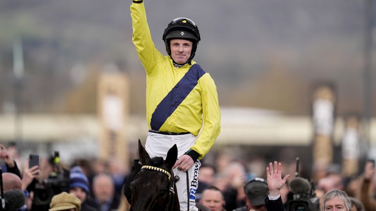 Sean Flanagan celebrates winning the Champion Chase aboard Marine Nationale